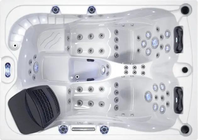 Top-down view of the Vitality jacuzzi in modern white, featuring multiple jets, two headrests, built-in seating, and a black covered compartment—perfect for a relaxing European-style letting experience.